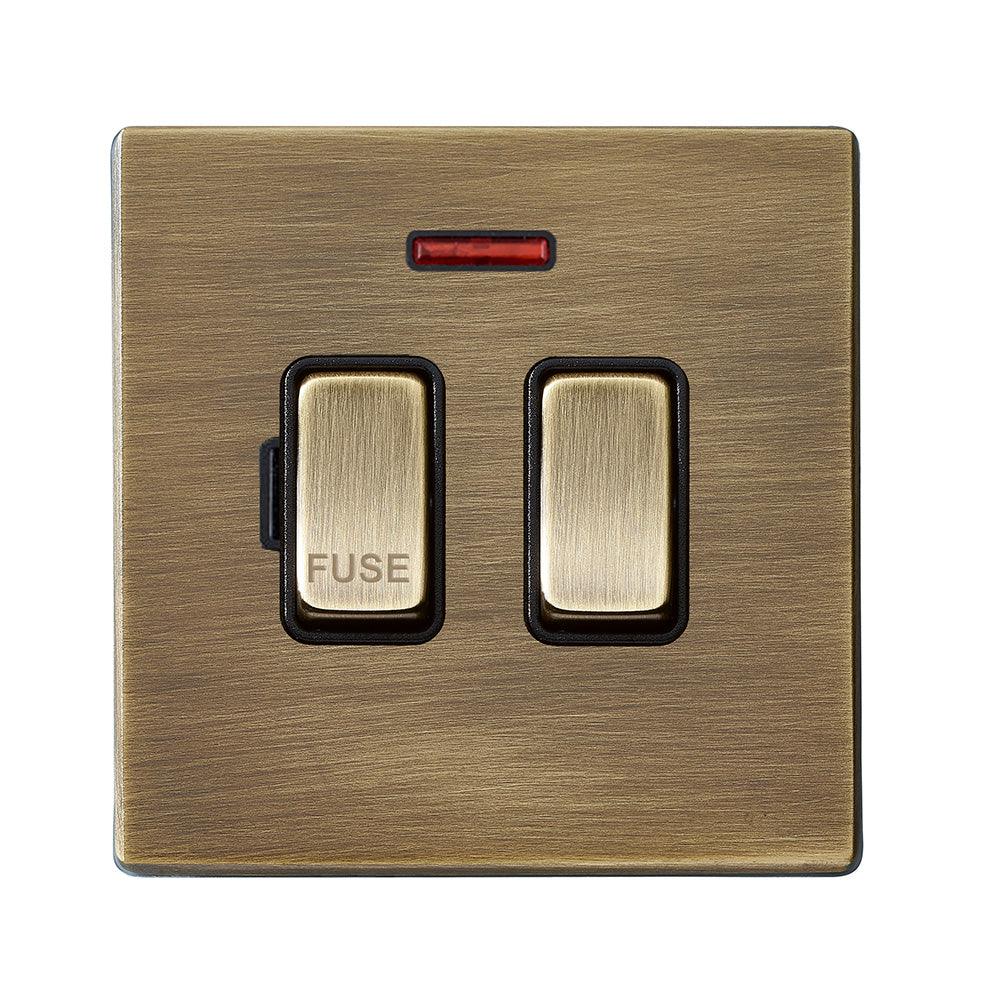 Hartland G2 7G29SPNAB-B 1 gang 13A Double Pole Fused Spur + Neon Antique Brass with Antique Brass/Black Inserts