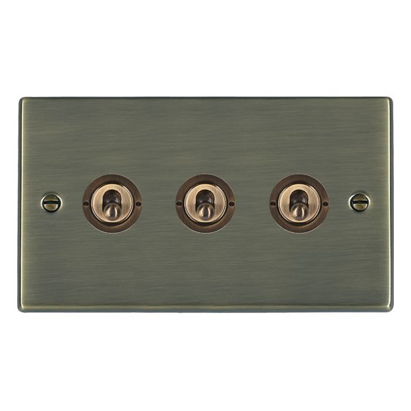 Hartland 79T23 3 gang 20AX 2 Way FL Toggle Antique Brass with Antique Brass Inserts