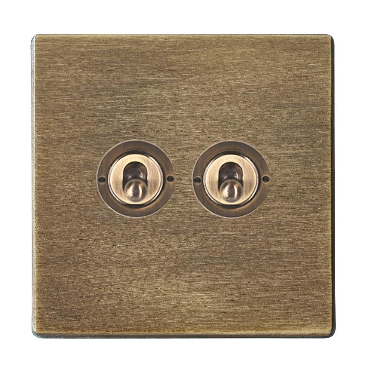 Hartland G2 7G29T22 2 gang 20AX 2 Way FL Toggle Antique Brass with Antique Brass Inserts